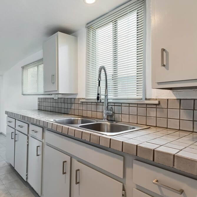 Mediterranean home remodel guest house kitchen before